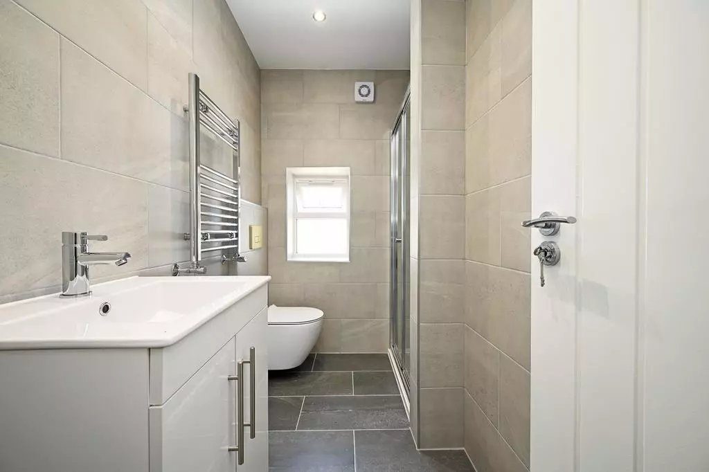 Renovated bathroom — modern tiling and fittings