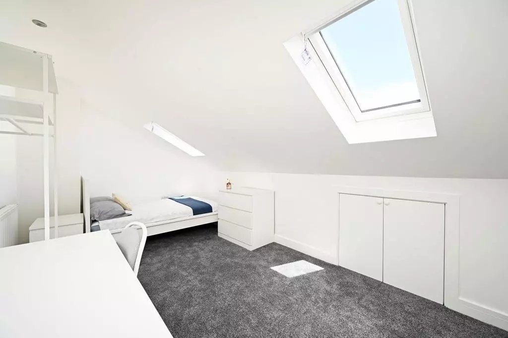 Bedroom 5 — converted loft space